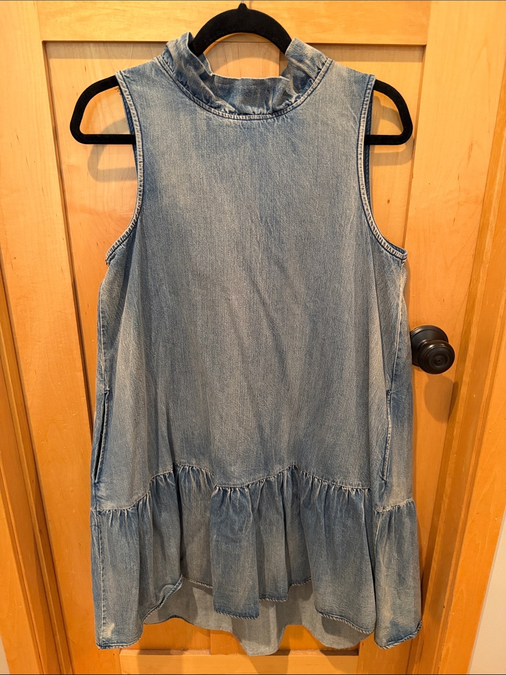 Boutique Sleeveless Light Wash Denim Ruffle Hem Dress with pockets!